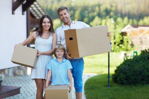 Professional movers loading office items for a Soho relocation