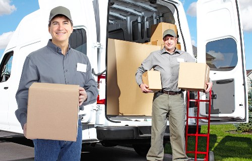 Stacked packing cartons for a compact Soho flat or office relocation