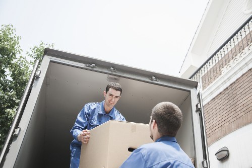 Professional movers handling fragile items in central London